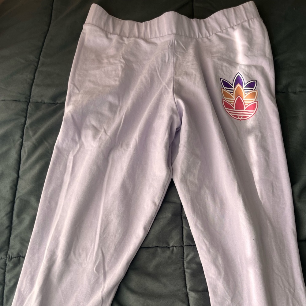 Purple adidas multi colored leggings.🎀